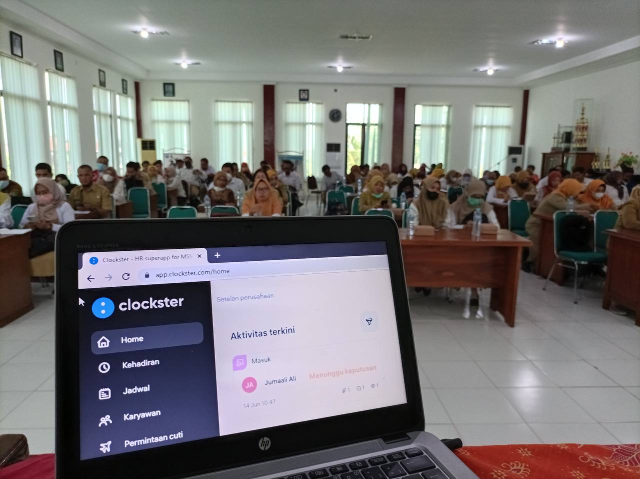 An Indonesian state school learning about Clockster functionality
